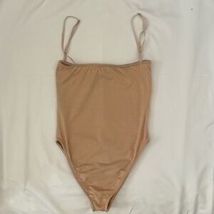 AREYOUAMI Kimia bodysuit in nude cream beige